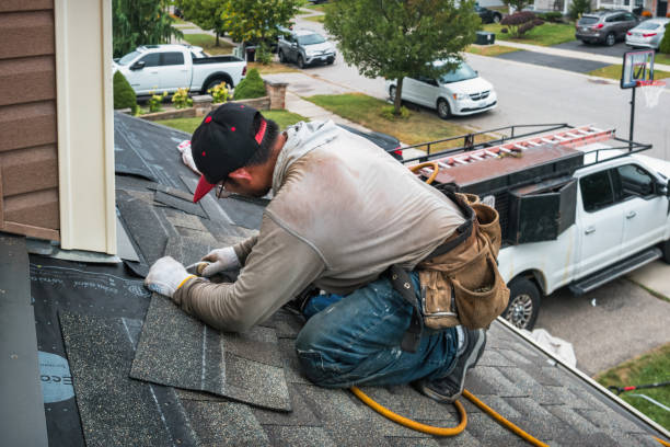 Professional Gutter Repair And Installation technician working in Rogers, CT